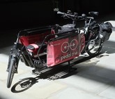 Red and black Pedal Me cargo bike 
