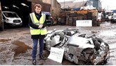Mayor Andy Street with the crushed Citroen at Mainline Salvage car recycling centre in Wolverhampton