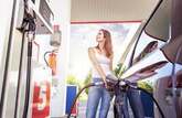 Woman refuelling car