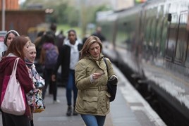 Female passenger at rail station